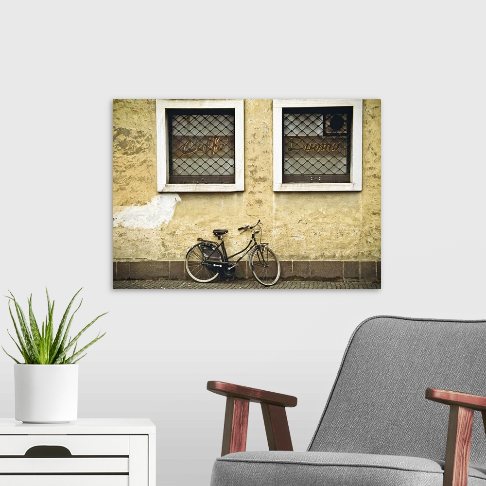 A modern room featuring A bicycle on a street no.2