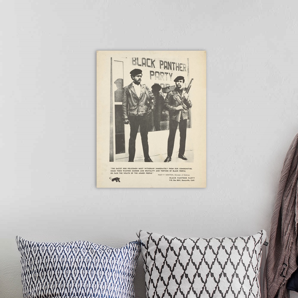 A bohemian room featuring Framed black and white poster of Huey Newton and Bobby Seale in front of the storefront headquart...