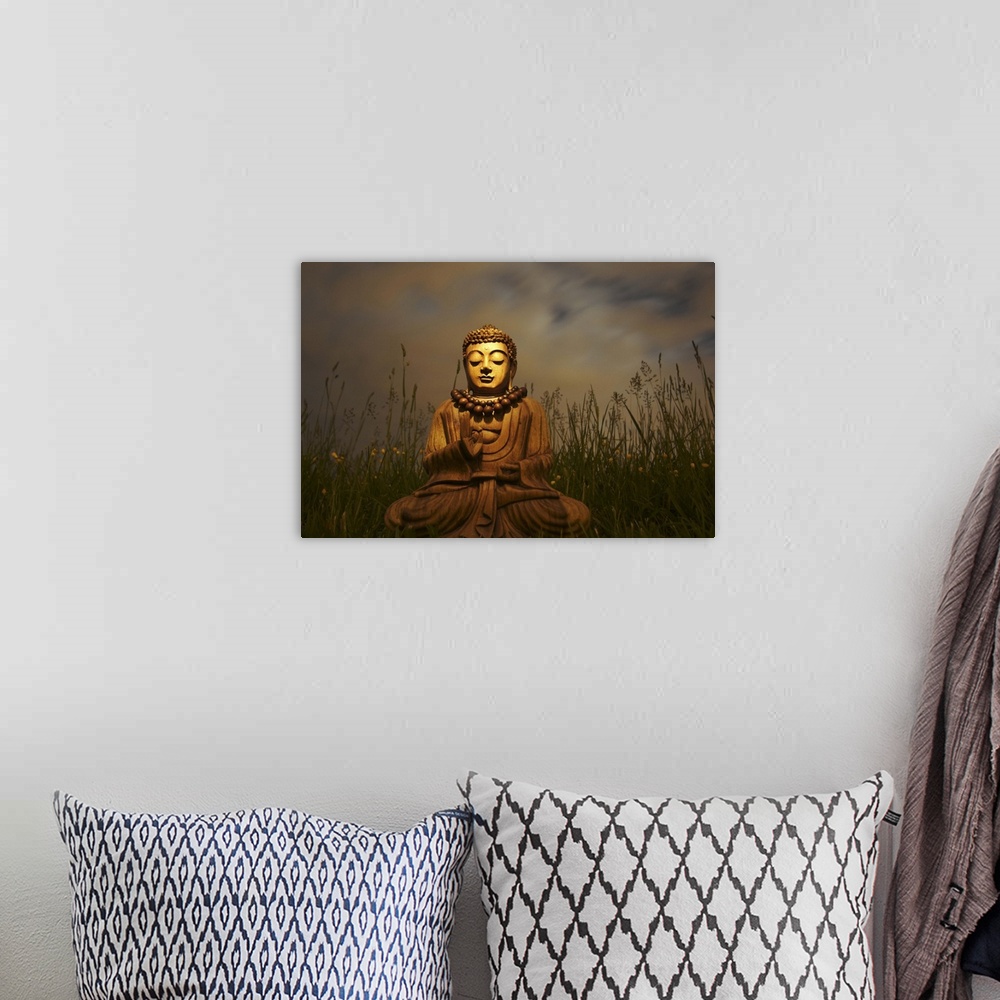 A bohemian room featuring A bhudda in long grass