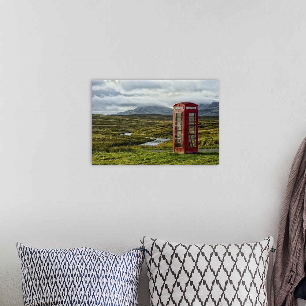 A bohemian room featuring Telephone kiosk in remote location in Scotland, UK.