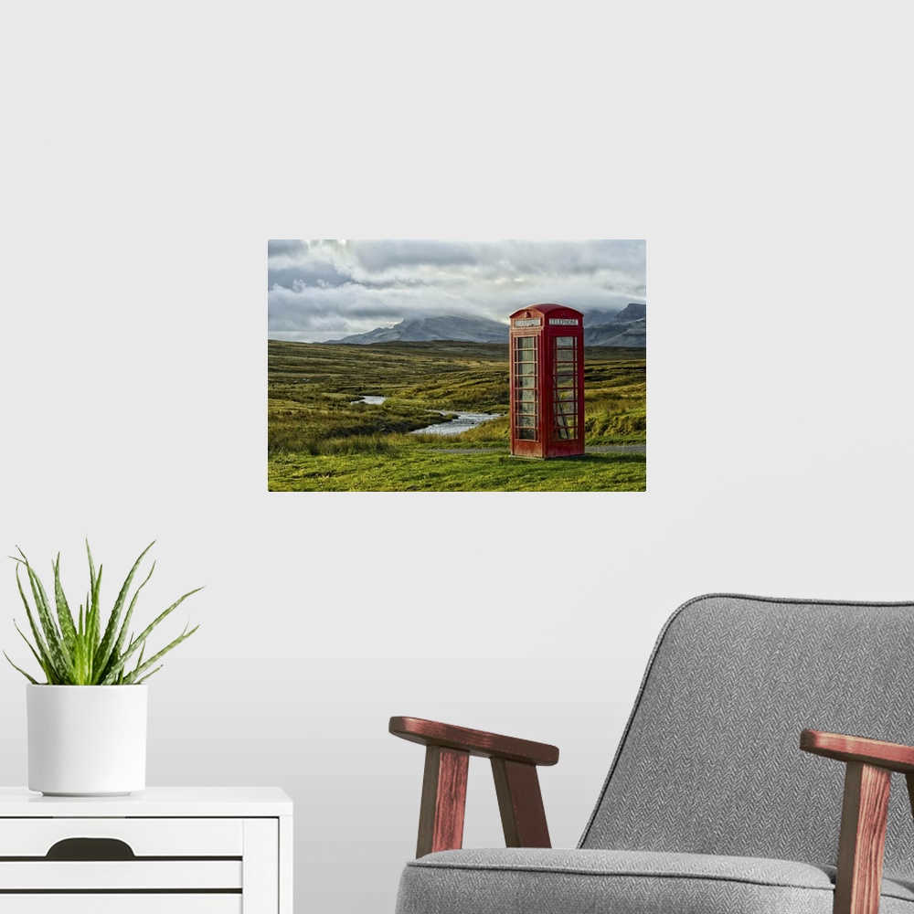 A modern room featuring Telephone kiosk in remote location in Scotland, UK.