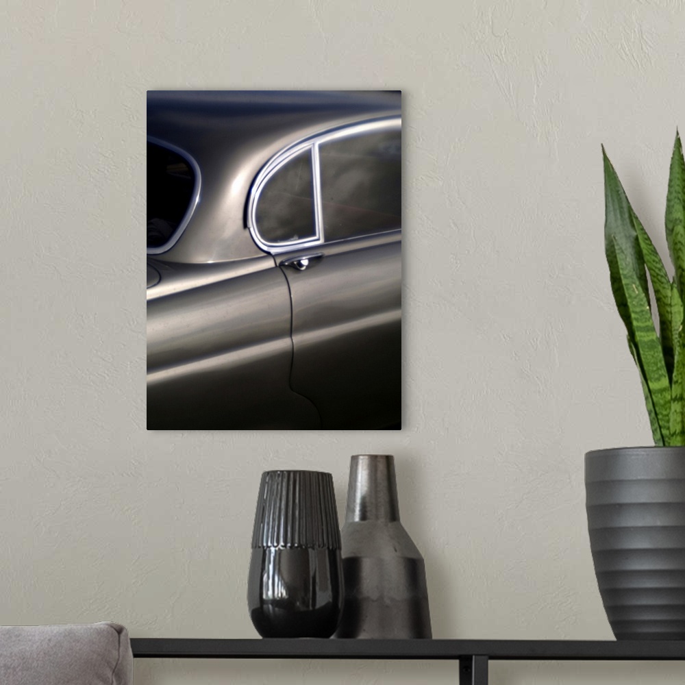 A modern room featuring Vintage Car Quarter View with window and door