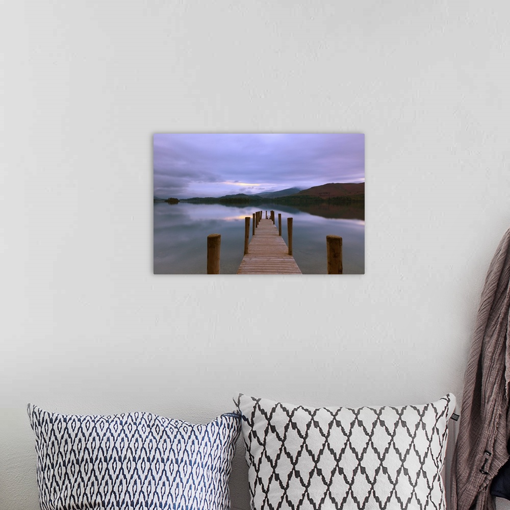 A bohemian room featuring Jetty at twilight in the Lake District looking across still water with reflections