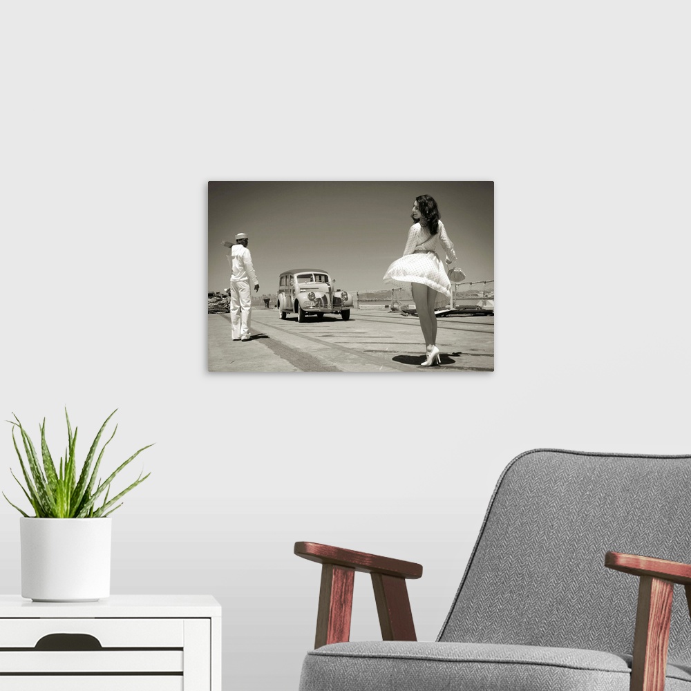 A modern room featuring A model wearing a short white dress near a sailor and vintage car