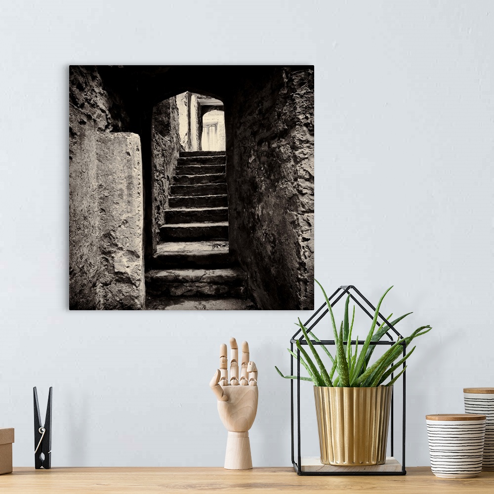 A bohemian room featuring Doorway and steps in medieval castle ruins. Beupre Castle, Wales