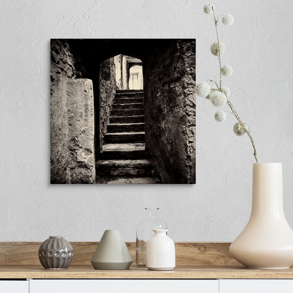 A farmhouse room featuring Doorway and steps in medieval castle ruins. Beupre Castle, Wales