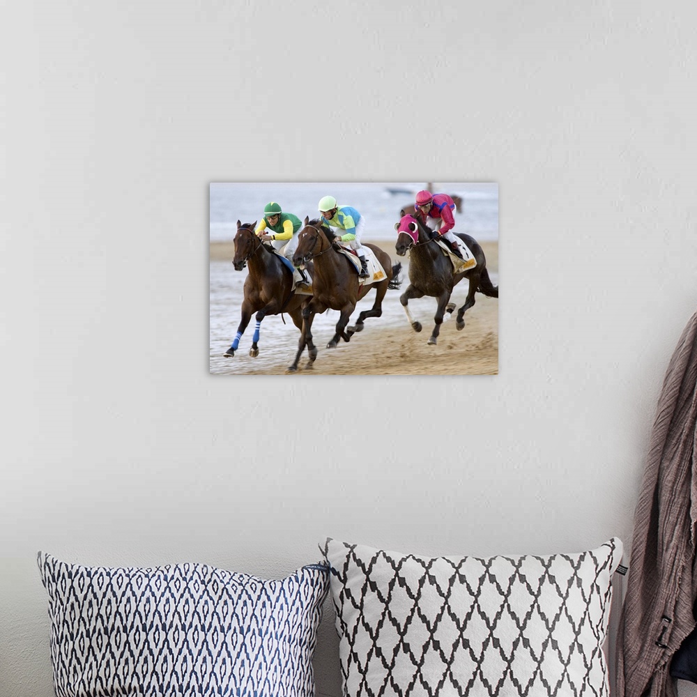 A bohemian room featuring Thoroughbred horses compete at sea shore with green horizon of ?Doana National Park? and the whol...