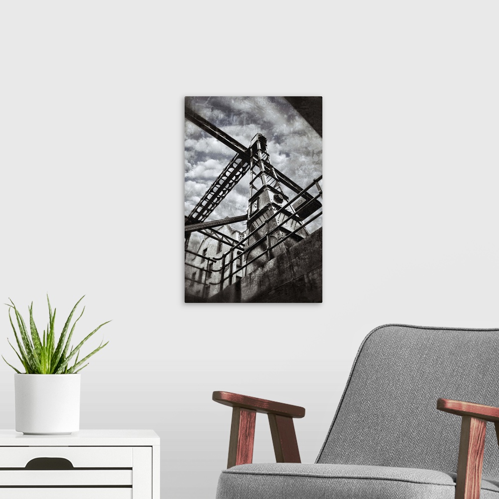 A modern room featuring An iron bridge seen from one of the many canals running through Amsterdam.