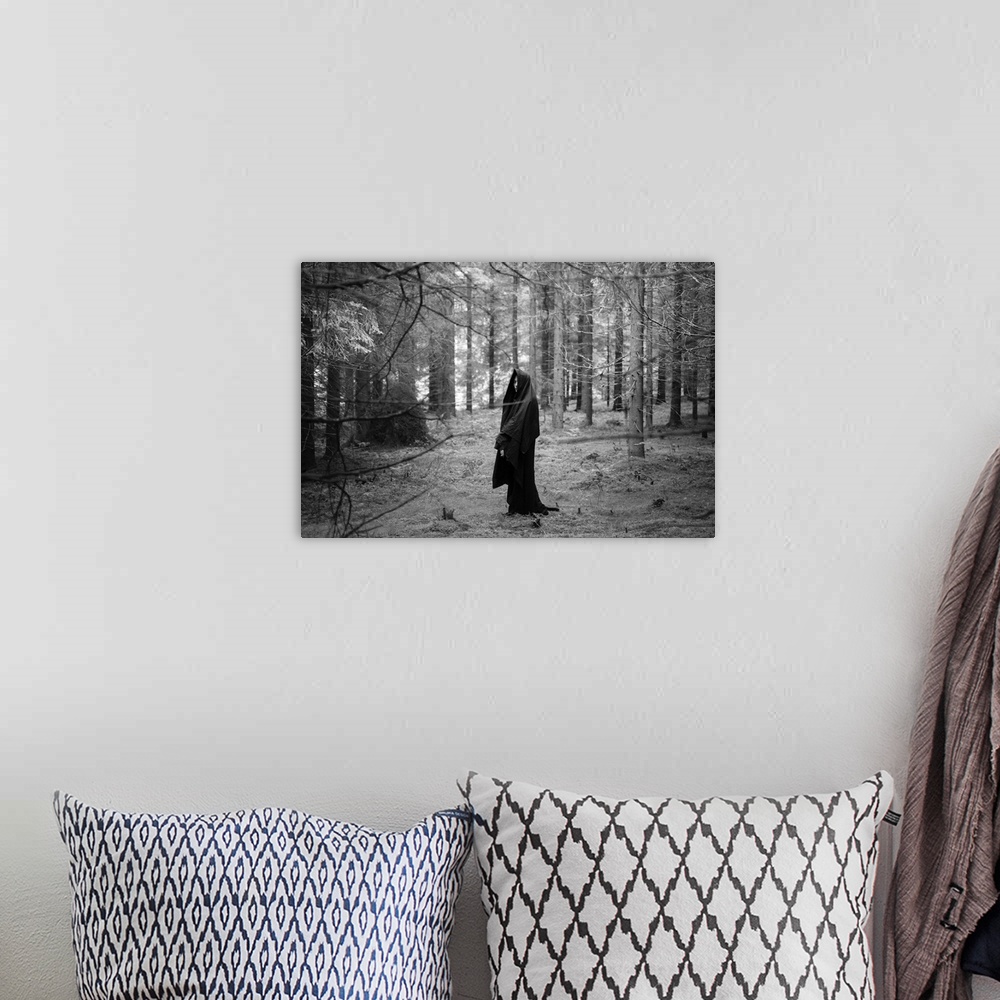 A bohemian room featuring Young adult female wearing veil standing alone in dark forest in winter