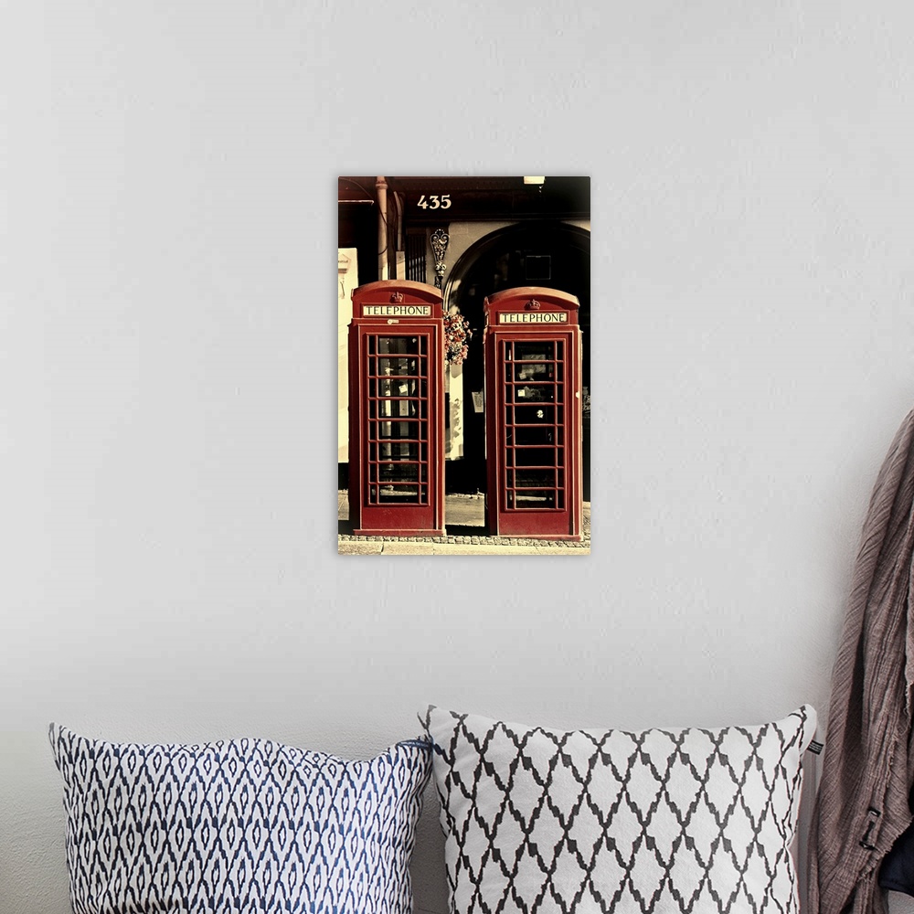A bohemian room featuring UK phonebox olde look