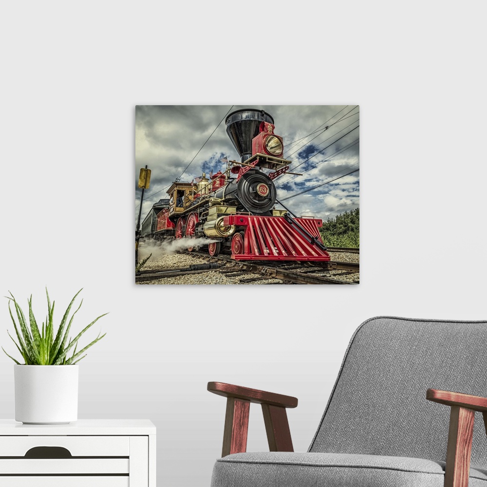 A modern room featuring Leviathan 63 Steam Engine with red and black paintwork from 19th century in USA.