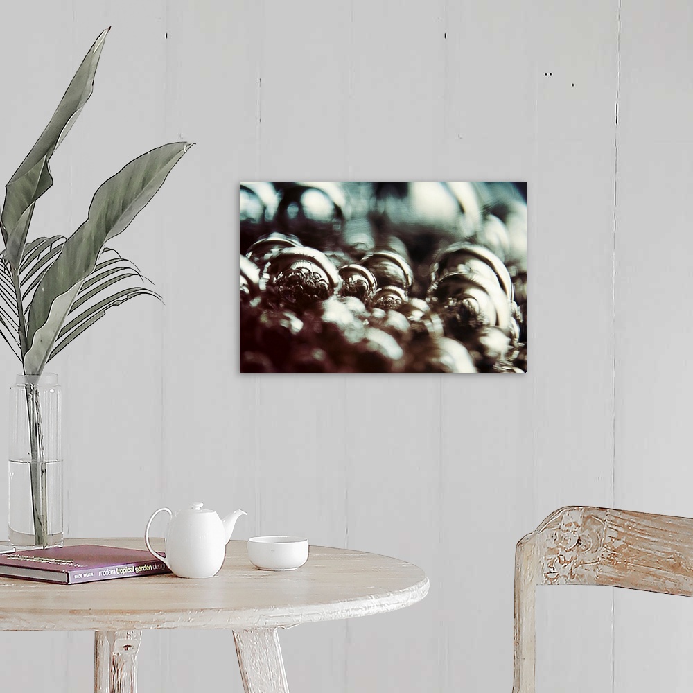 A farmhouse room featuring Surreal and abstract still life image of reflective baubles
