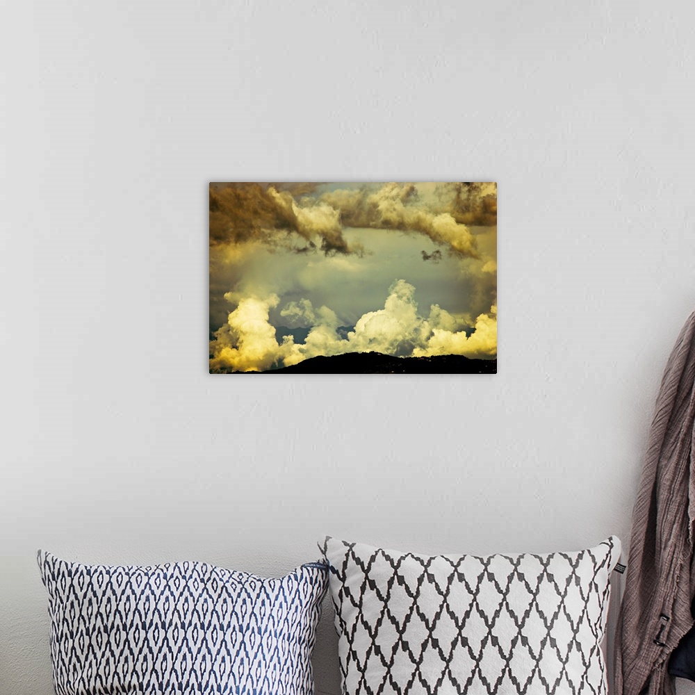 A bohemian room featuring Scattered monsoon clouds above hills