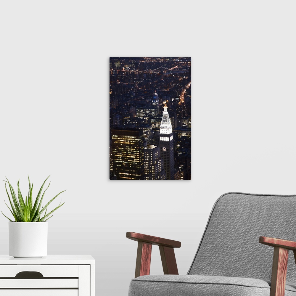 A modern room featuring Nocturnal view of Midtown and Downtown Manhattan from the Empire State Building, NYC, USA