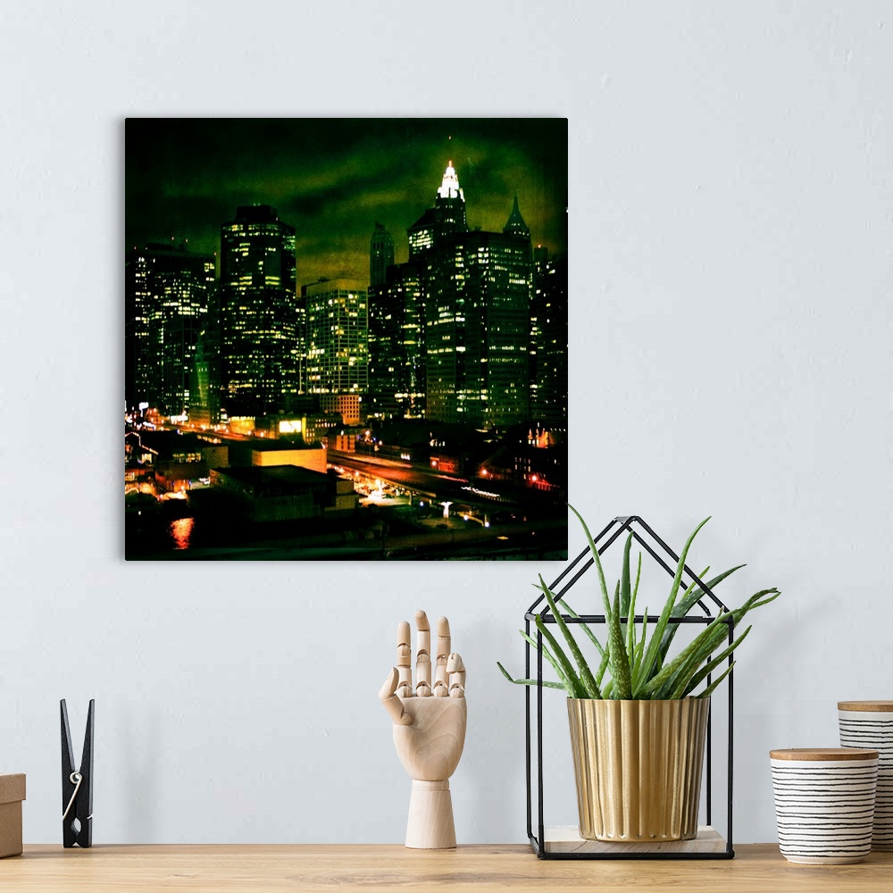 A bohemian room featuring New York City at night with highrise buildings
