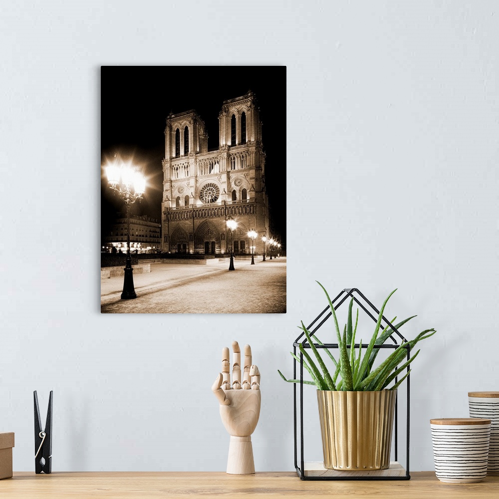 A bohemian room featuring Notre Dame, Paris, France at night