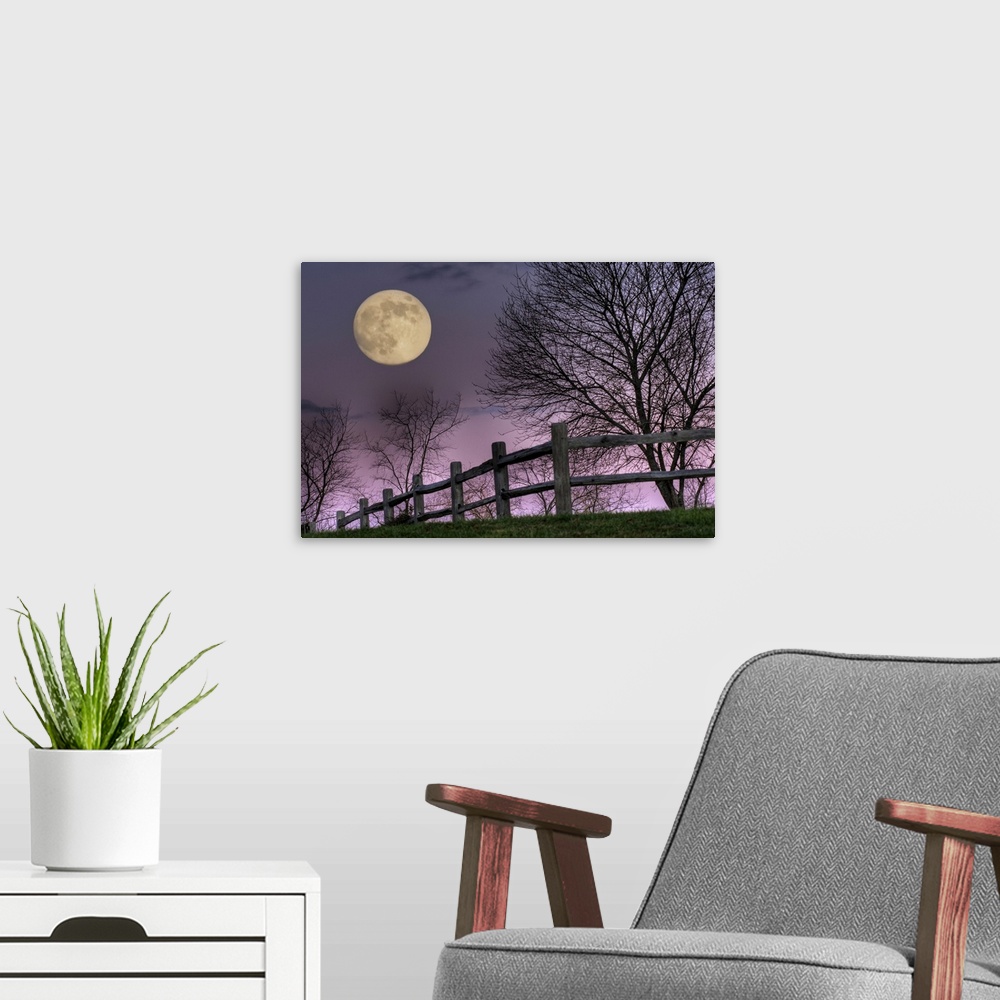 A modern room featuring November Moon rising over hill at Inn at Cedar Falls in Hocking Hills