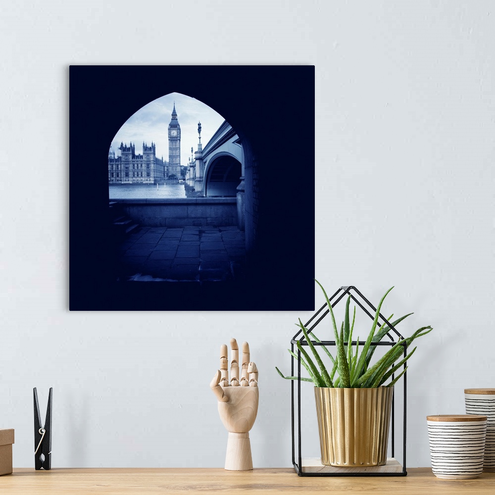A bohemian room featuring Houses of Parliament and Big Ben seen through arch, Westminster, London, UK