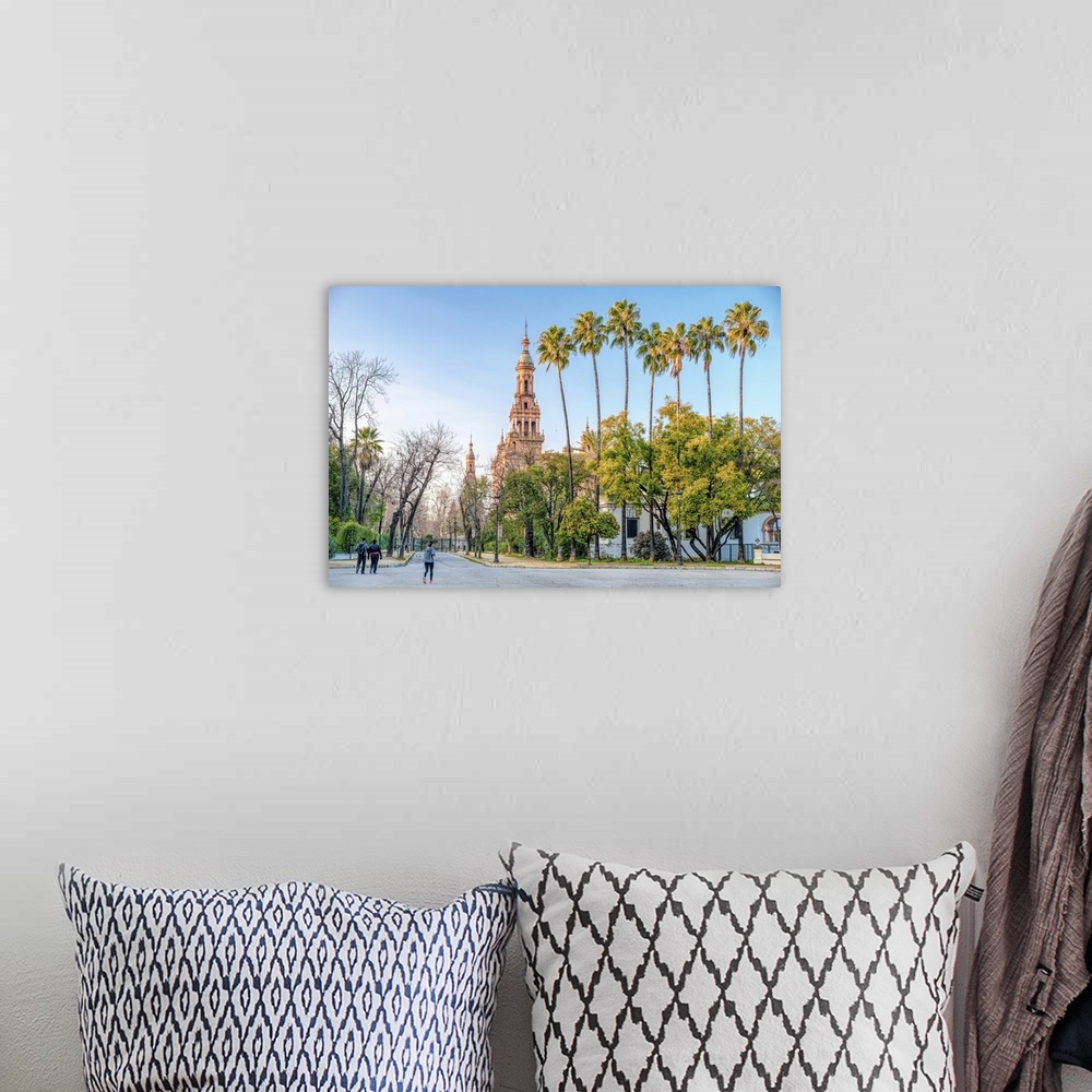 A bohemian room featuring Plaza de Espana from Maria Luisa Park, Seville, Spain with palm trees.