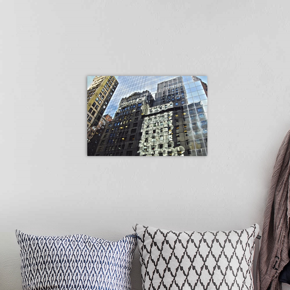 A bohemian room featuring Reflections in the windows of buildings in Midtown Manhattan, New York City.