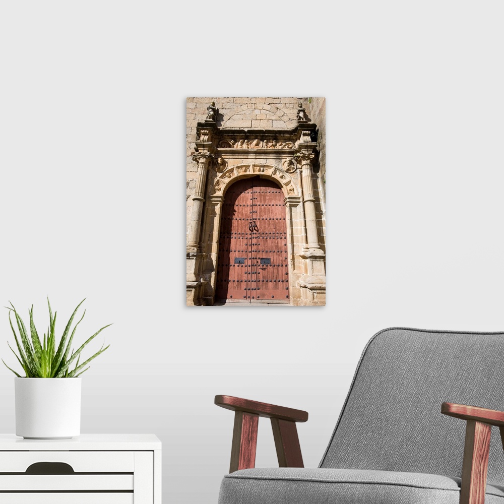 A modern room featuring Renaissance doorway, San Mateo church, Caceres, Spain
