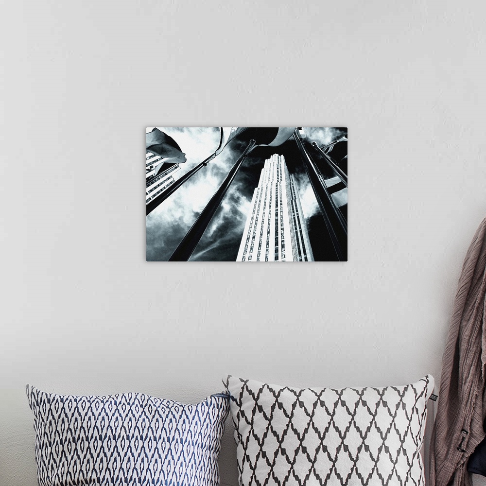 A bohemian room featuring Dramatic black and white of Rockefeller Center from a low angle.
