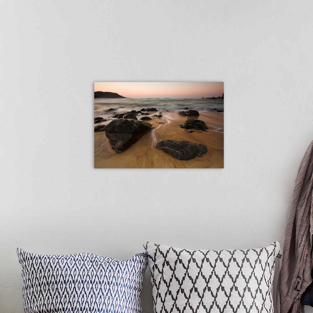 A bohemian room featuring Rocks and sunset at Dhail Mor beach, Lewis, Outer Hebrides