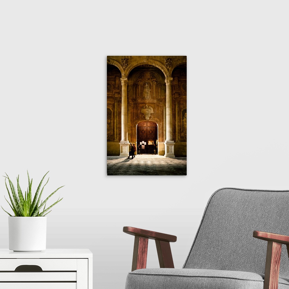 A modern room featuring Some people at the entrance of the Santo Domingo Church in Granada, Spain
