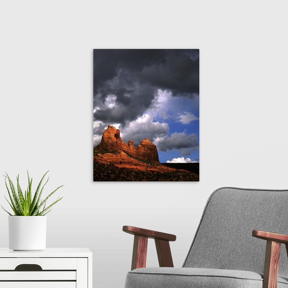 A modern room featuring Rocky landscape and stormy sky in USA