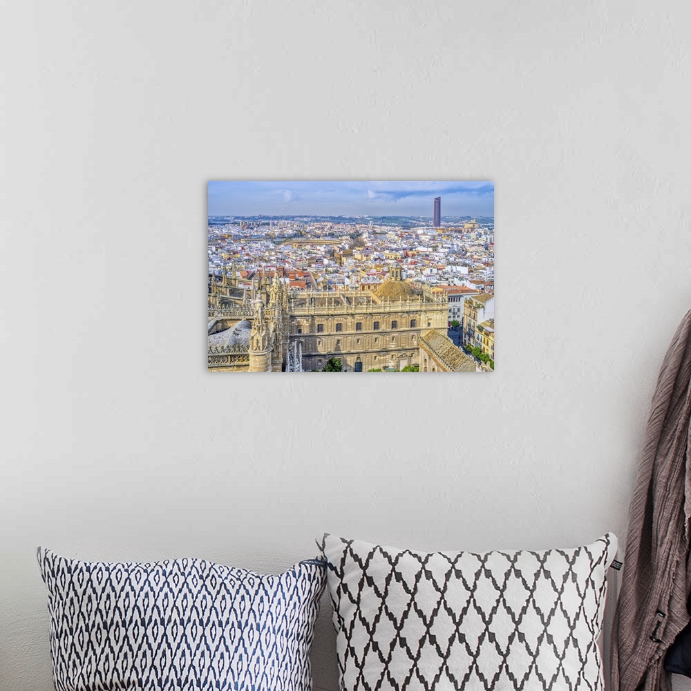 A bohemian room featuring Westward view of the city of Seville from the Giralda tower, Spain.