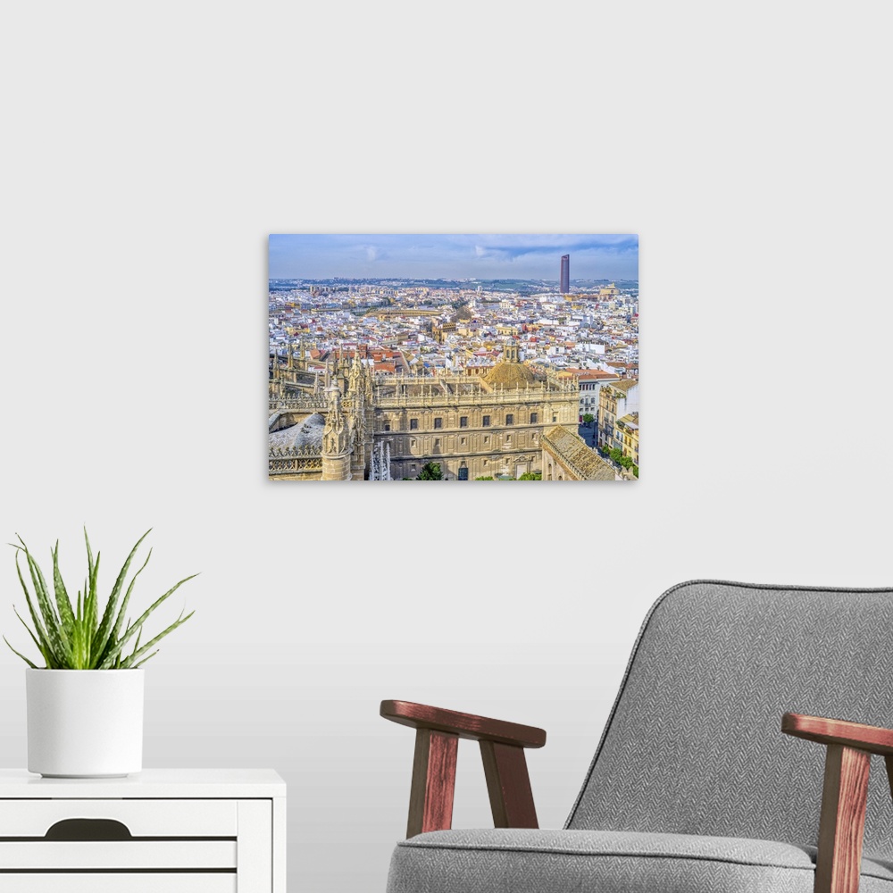 A modern room featuring Westward view of the city of Seville from the Giralda tower, Spain.