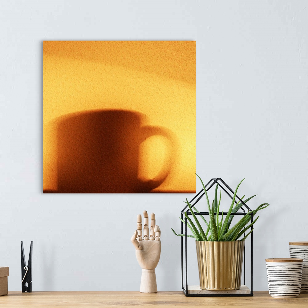 A bohemian room featuring Shadow of a coffee mug