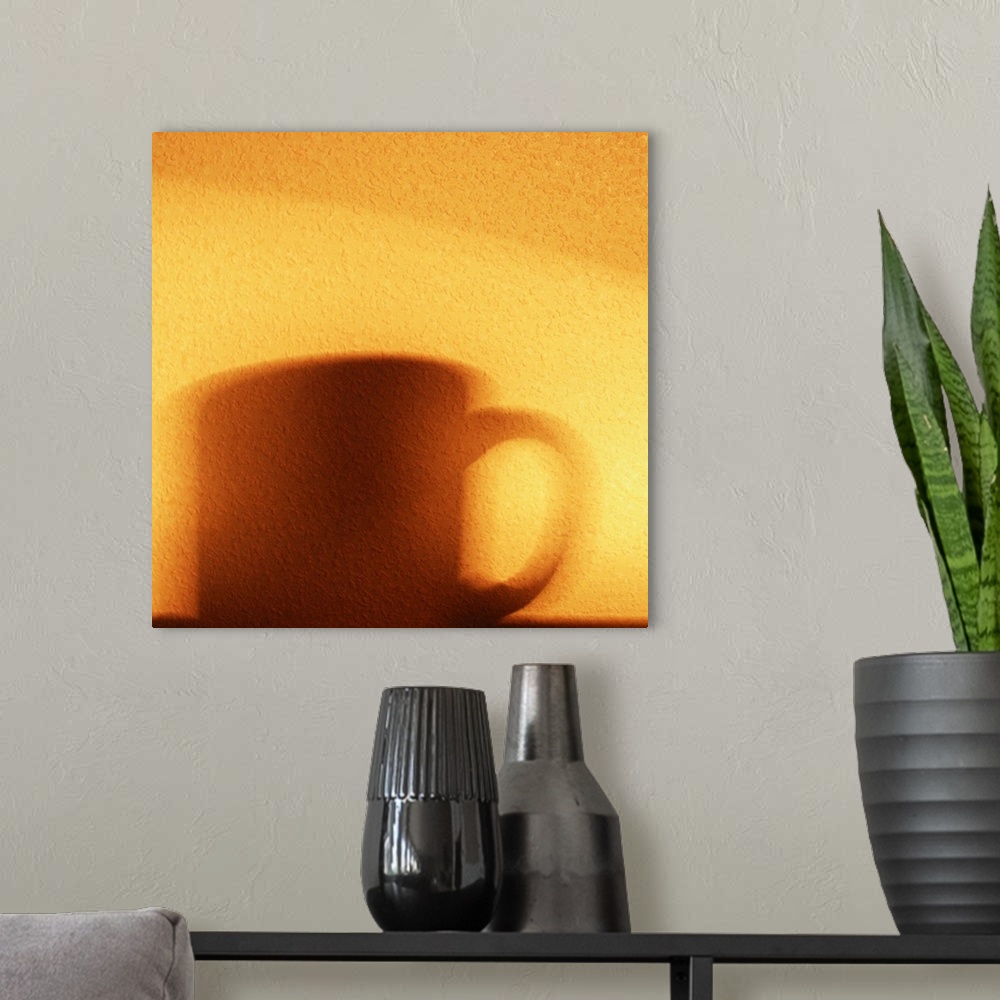A modern room featuring Shadow of a coffee mug