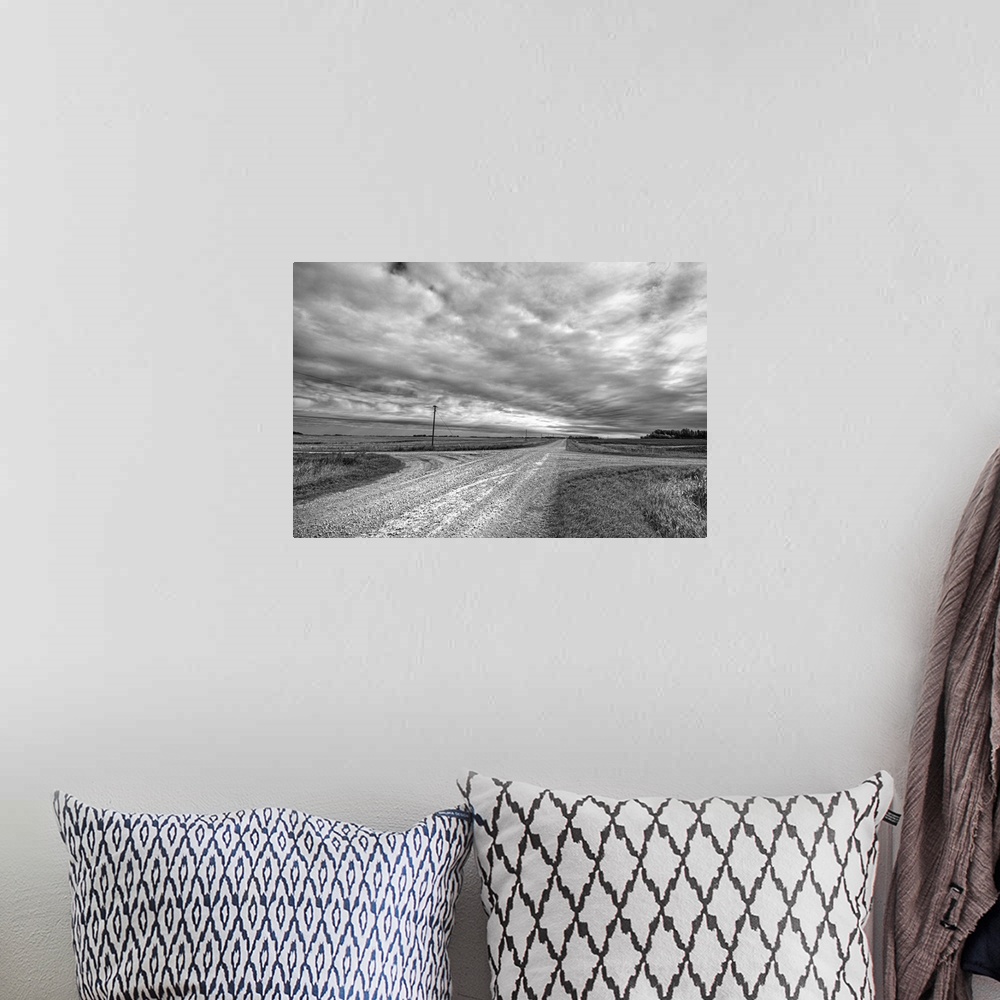 A bohemian room featuring Grey skies above cross roads in North Dakota, Cavalier County USA
