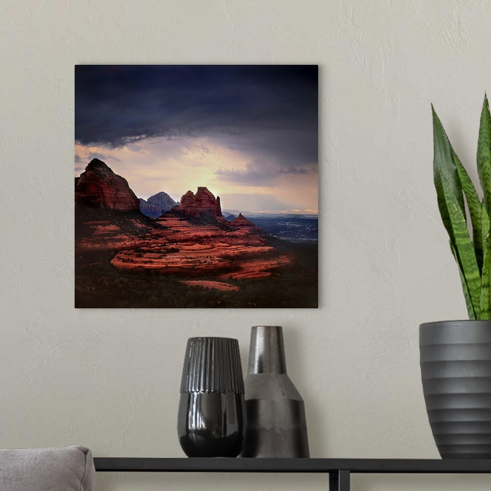 A modern room featuring Stormy skies ocer a mountainous landscape