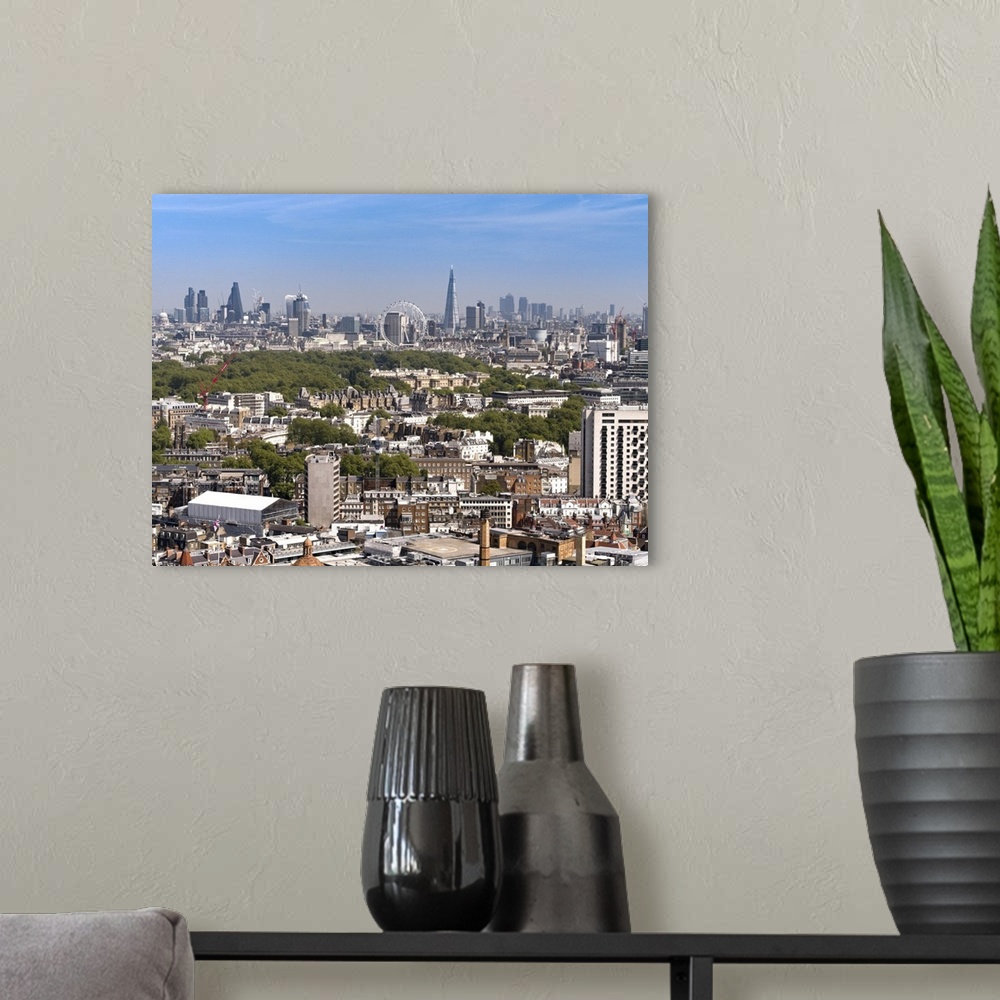 A modern room featuring Aerial view across London. The City of London is a city and county that contains the historic cen...