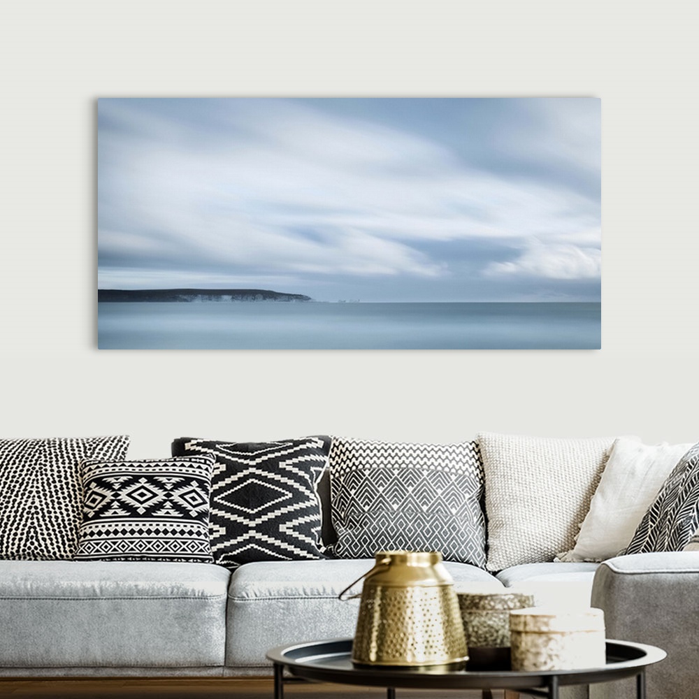 A bohemian room featuring Long exposure seascape looking towards an island