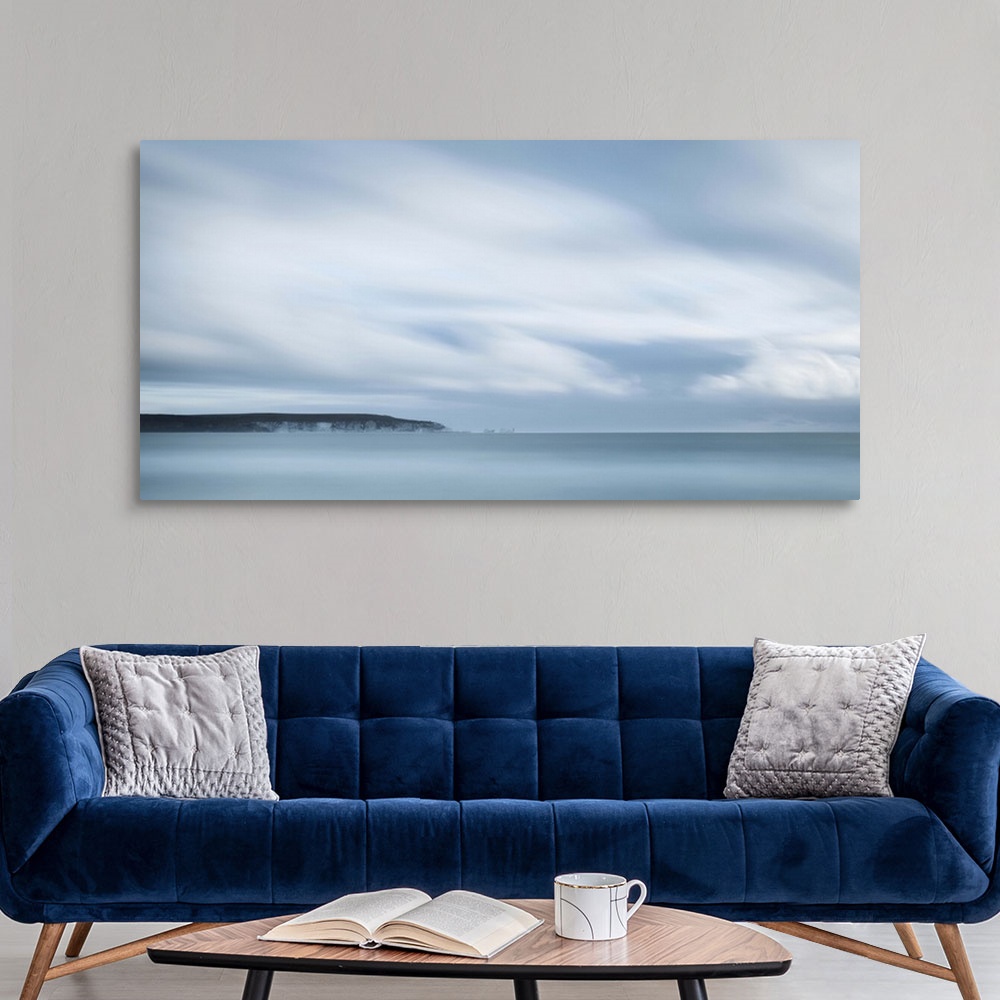 A modern room featuring Long exposure seascape looking towards an island
