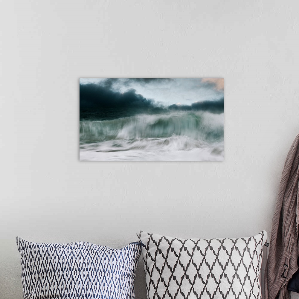 A bohemian room featuring Crashing waves with a stormy sky