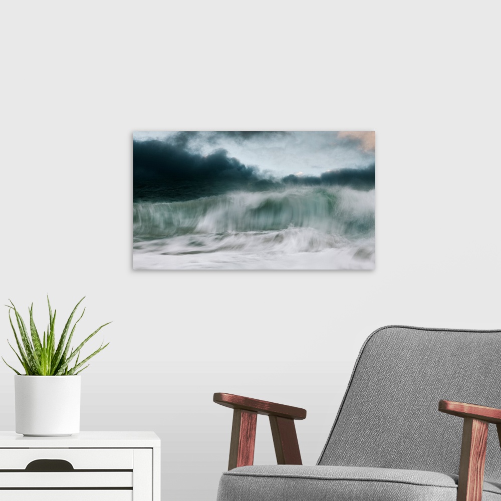 A modern room featuring Crashing waves with a stormy sky