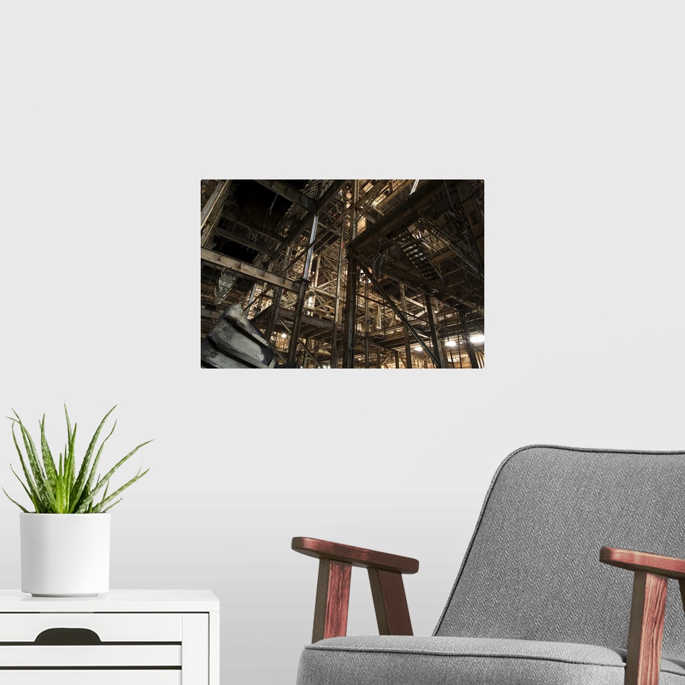 A modern room featuring The steel structure of an old factory