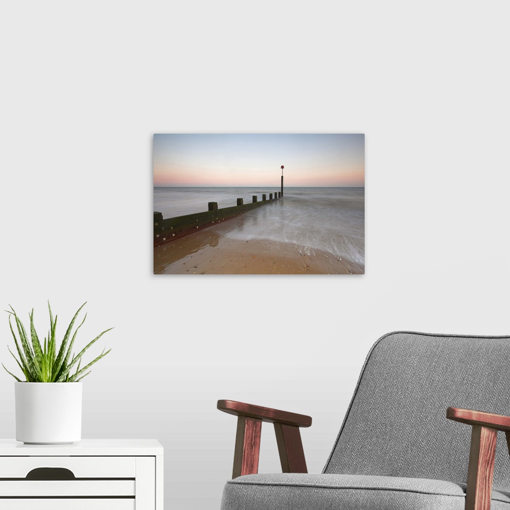 A modern room featuring Breakwater at dawn