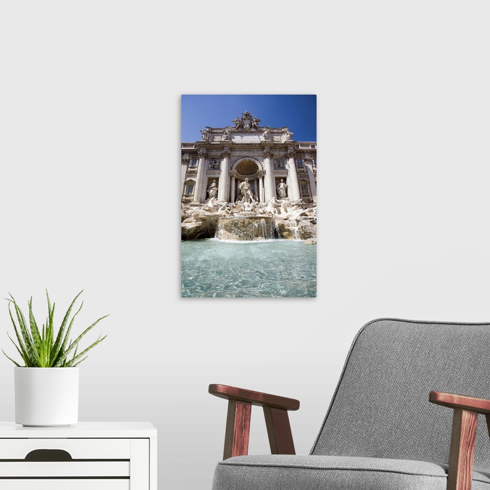 A modern room featuring Trevi fountain, Rome