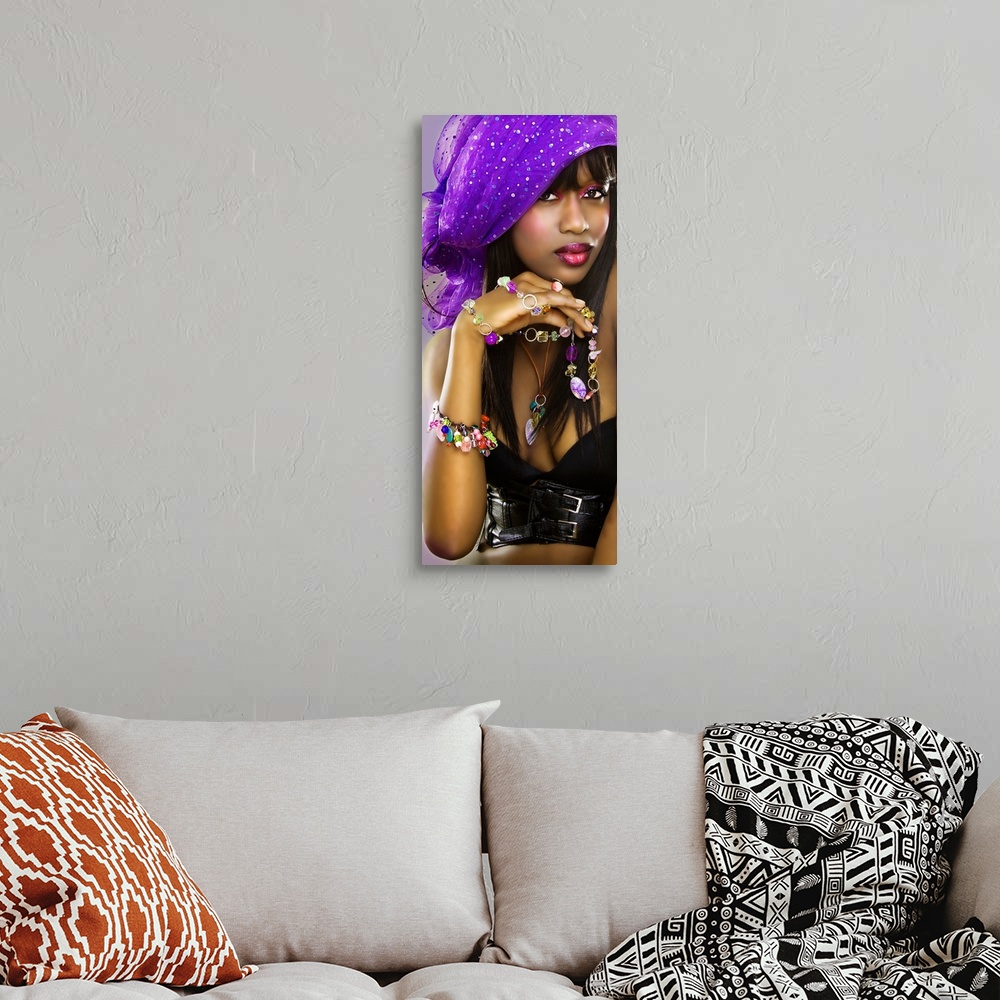A bohemian room featuring Young woman wearing head scarf looking at camera