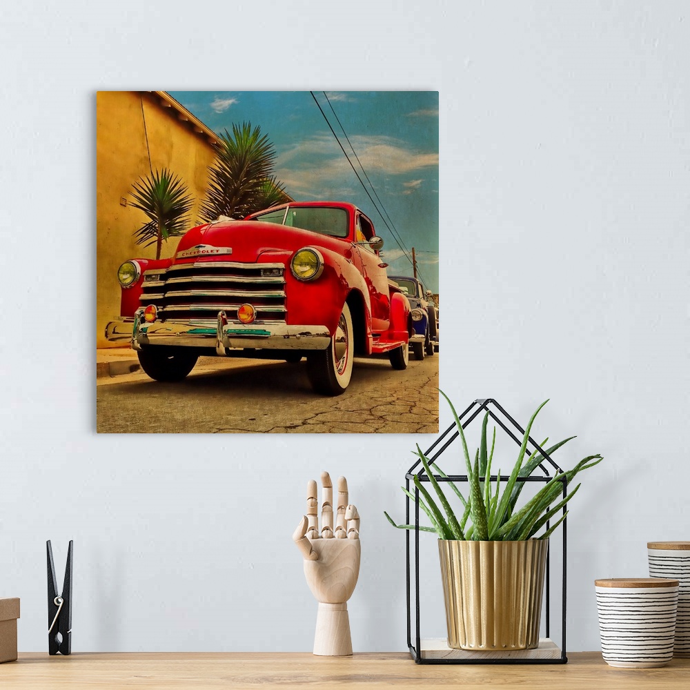 A bohemian room featuring Red pickup truck parked on the street