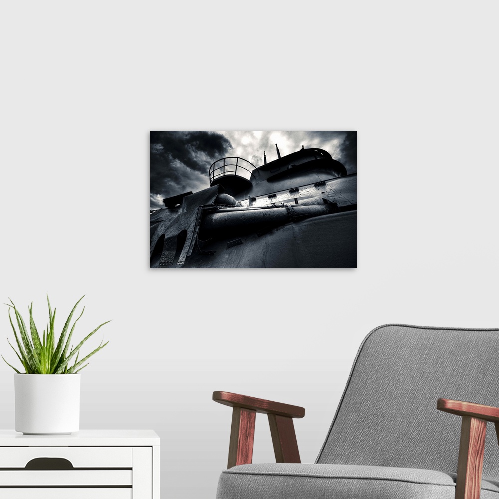 A modern room featuring German submarine U-534 conning tower.