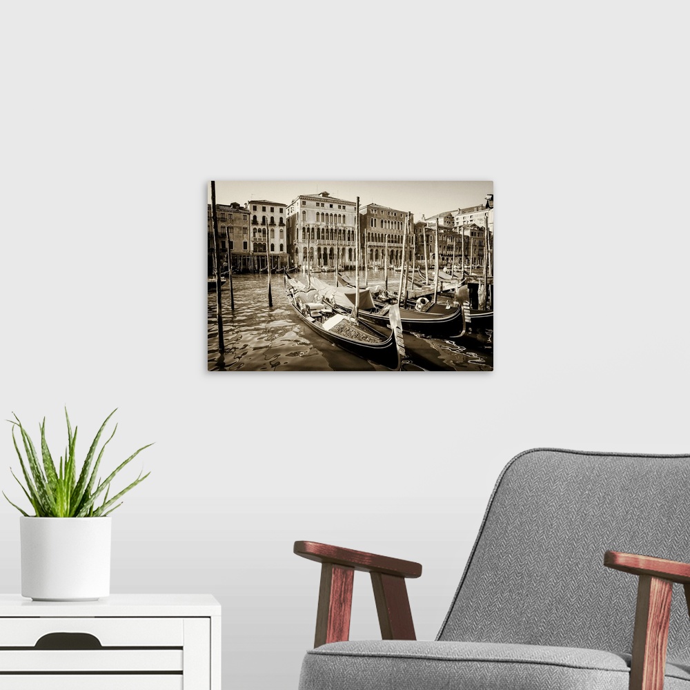 A modern room featuring Close up of gondolas on the grand canal in Venice, Italy in summer with buildings lining the wate...