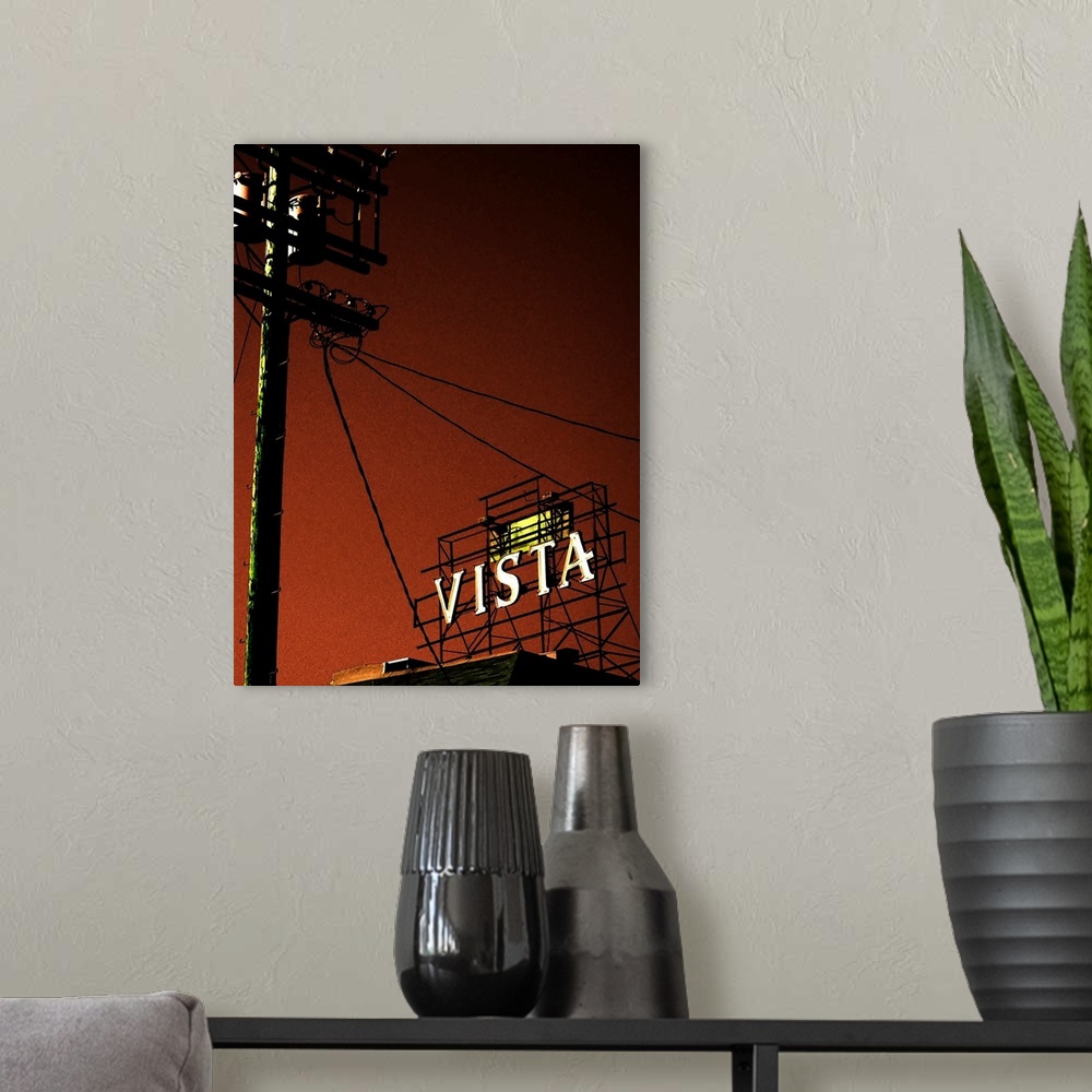 A modern room featuring The Vista theatre sign in Hollywood