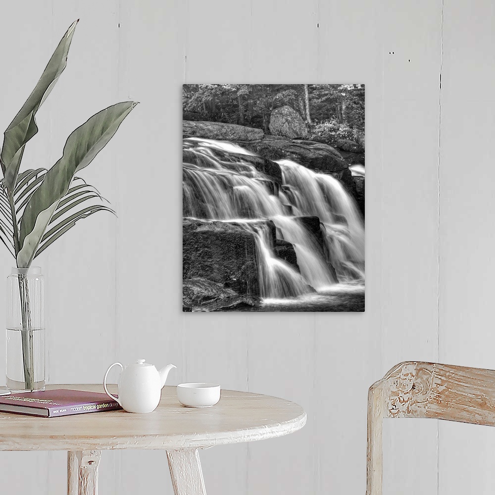 A farmhouse room featuring Water flowing over rocks on a waterfall