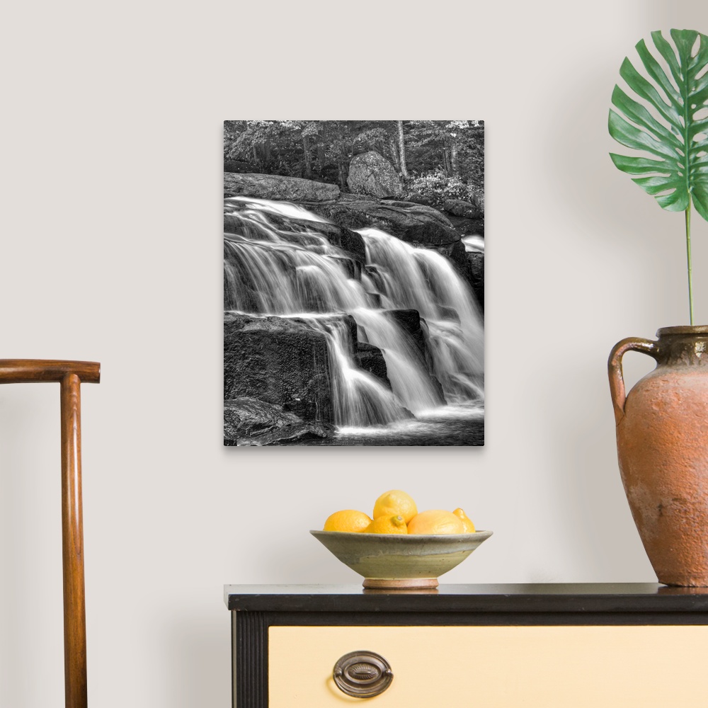 A traditional room featuring Water flowing over rocks on a waterfall